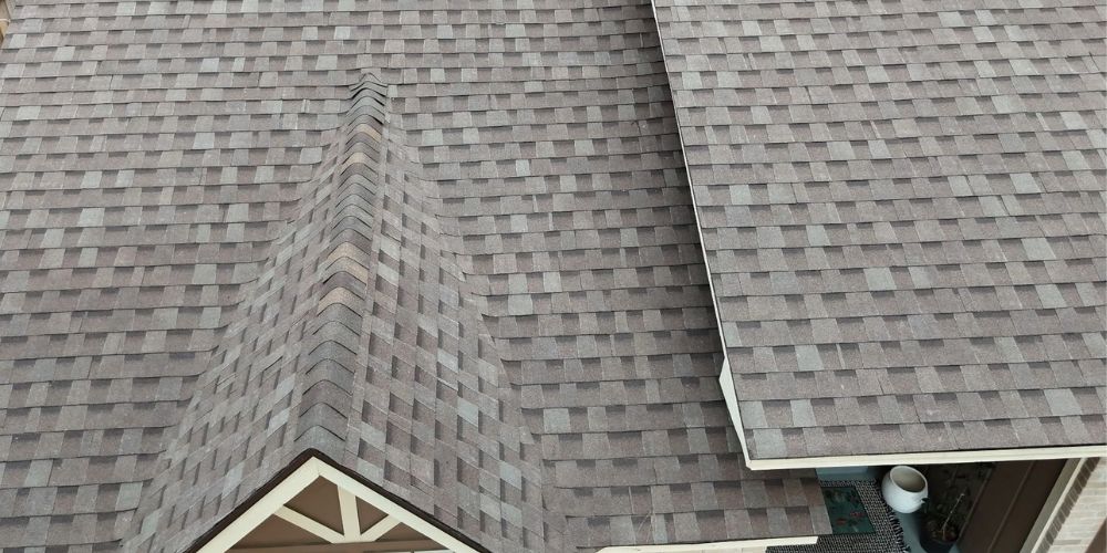 Close up of newly completed shingle roof.